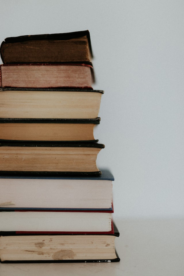 A stack of eight books
